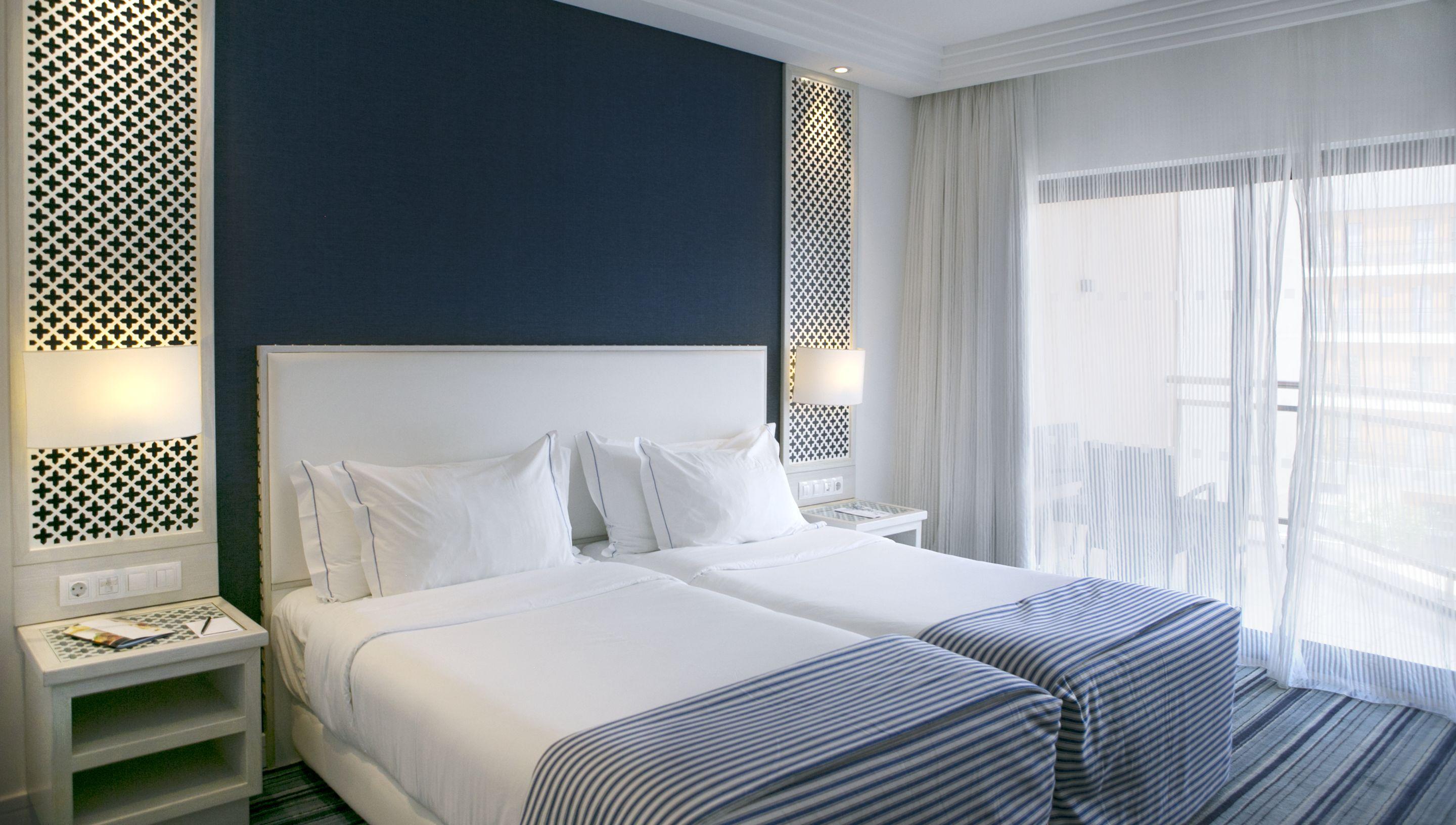 Real Marina Hotel & Spa Olhão Dış mekan fotoğraf A bedroom at the hotel