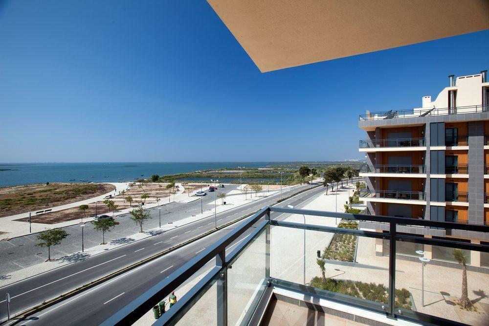 Real Marina Hotel & Spa Olhão Dış mekan fotoğraf View of the sea from the apartment